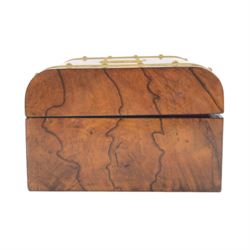 19th century walnut and brass bound games compendium box, painted to enhance the grain, of rectangular form, the hinged opening cover with rounded sides, central brass cartouche with engraved lion crest, and brass riveted straps, opening to reveal a red leather and blue silk lined compartmented interior, with fold-down games board, and lift-out tray containing playing cards, ebony turned dice towers, white and red stained bone draughts, and chess pieces, ivory dice, and ivory and ebony whist markers, and brass bezique board, cribbage board and markers, H15cm W32cm D24cm
This lot has been registered for sale under Section 10 of the APHA Ivory Act