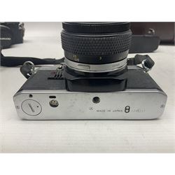 Olympus OM-2 camera body, serial no 1117526, with Olympus OM-System Zuiko Auto-W 28mm 1:2.8'  lens serial no 336591, Olympus OM10 camera body serial no 2392257, with Olympus OM-System Zuiko Auto-Macro 50mm 1:3.5' lens serial no 225784, Soligor C/D mirror lens 1:8 f=500mm' serial no 784035650 together with other camera equipment 