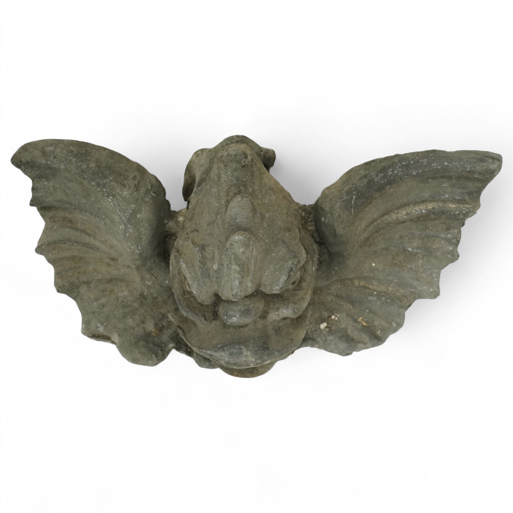 19th century cast lead fountain head with spout in the form of a grotesque fish, the mouth agape with rows of teeth, flanked by protruding fins 