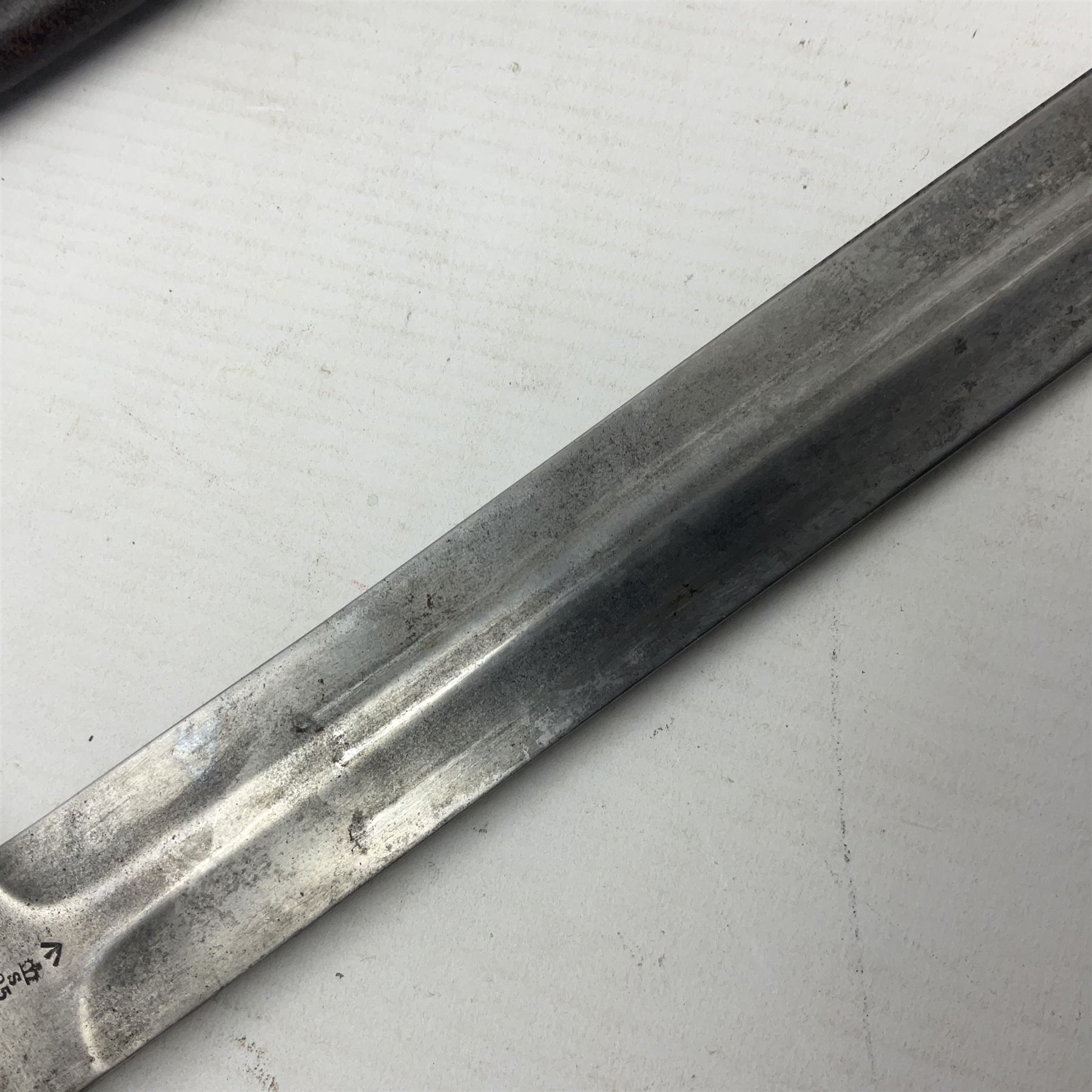 British Pattern 1888 knife bayonet, the 30cm double edged blade by Sanderson with central raised medial ridge and various marks to the ricasso including date code 12 98; in leather covered scabbard with various stamped marks L44cm overall