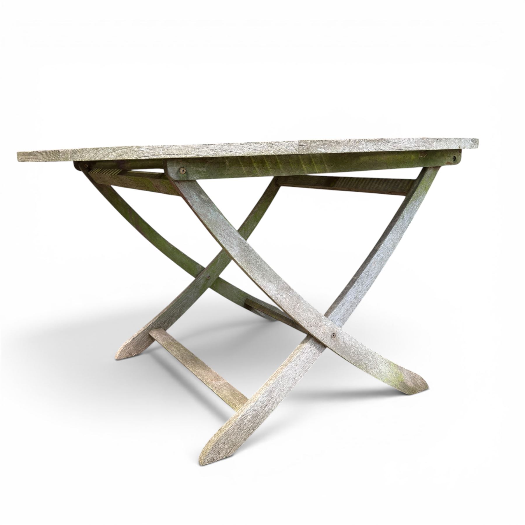Five piece teak garden dining set, comprising circular folding table and four folding armchairs, with slatted seats and backs in a weathered finish