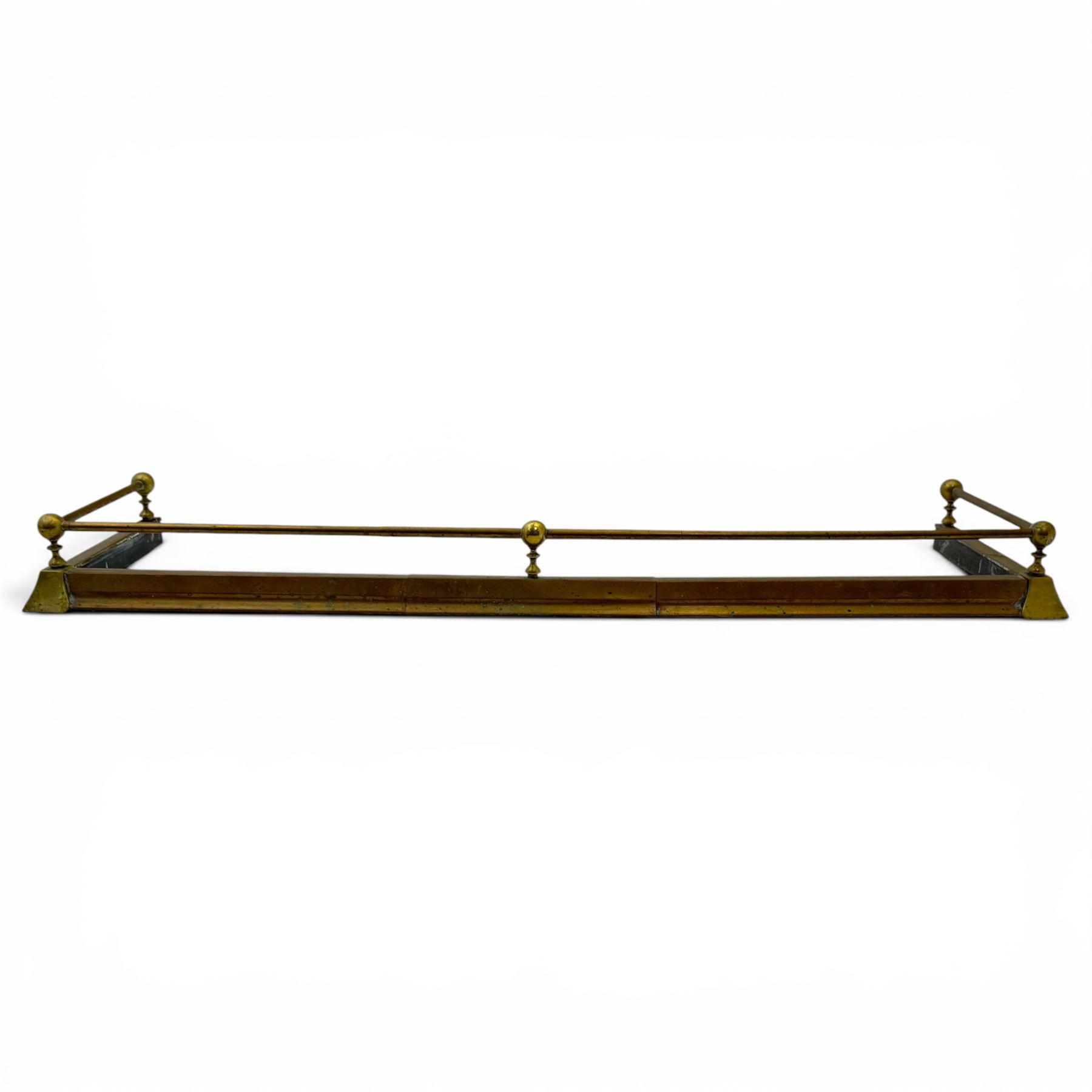 Three 20th century brass fenders, two with pierced Art & Crafts design rails, largest W156cm, D 45cm 