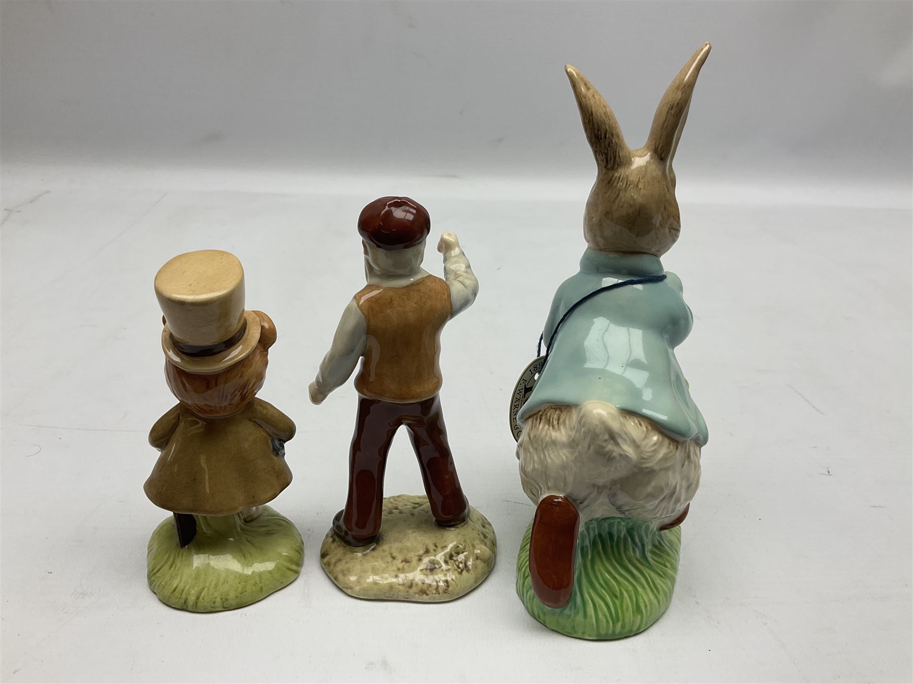 Six Beswick Beatrix Potter figures, comprising Miss Moppet, Tommy Brock, Peter Rabbit, Cecily Parsley, Mr Drake Puddle-Duck, Amiable Guinea Pig, together with four Royal Albert figures, Hunca Munca, Lady Mouse made a curtsy, Little Pig Robinson and Mr McGregor, all with printed mark beneath  (10)