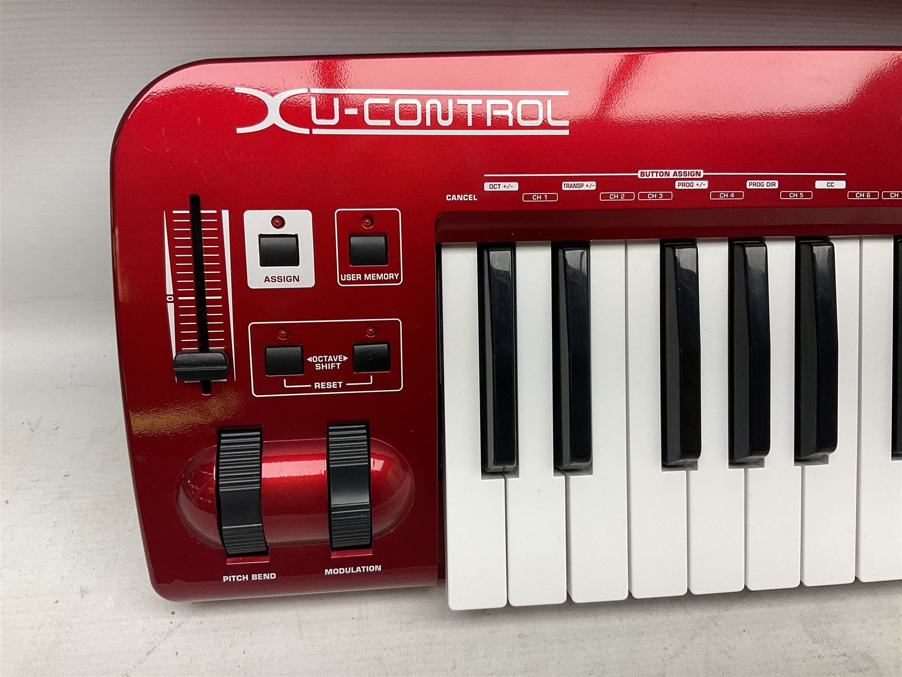 Behringer XU-CONTROL UMX610 USB/MIDI Controller sixty-one full-size touch sensitive keys, in red L98cm; boxed with lead