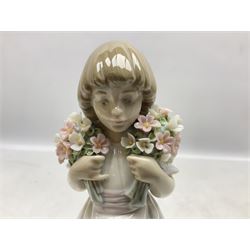 Three Lladro figures comprising, Pocket Full of Wishes no 7650, School Days no 7604 and Spring Bouquets no 7603, all with original boxes, largest example H26cm  