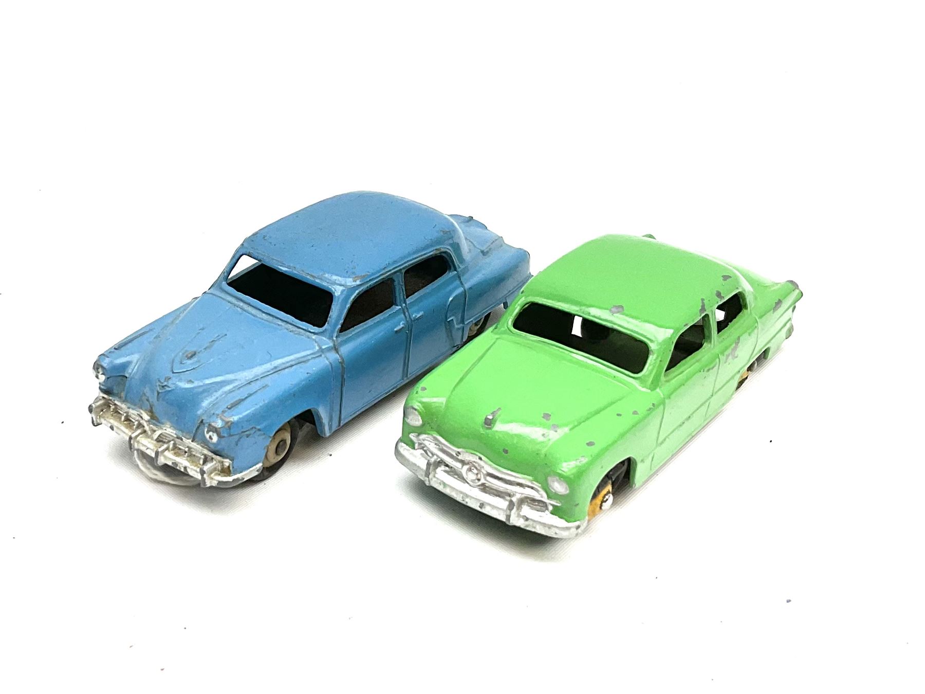 Dinky - seven unboxed and playworn die-cast cars comprising Studebaker, Ford Sedan, Rover 75, Vanguard, Austin Somerset and two Austin Devons; together with two Dublo size scale cars (9)