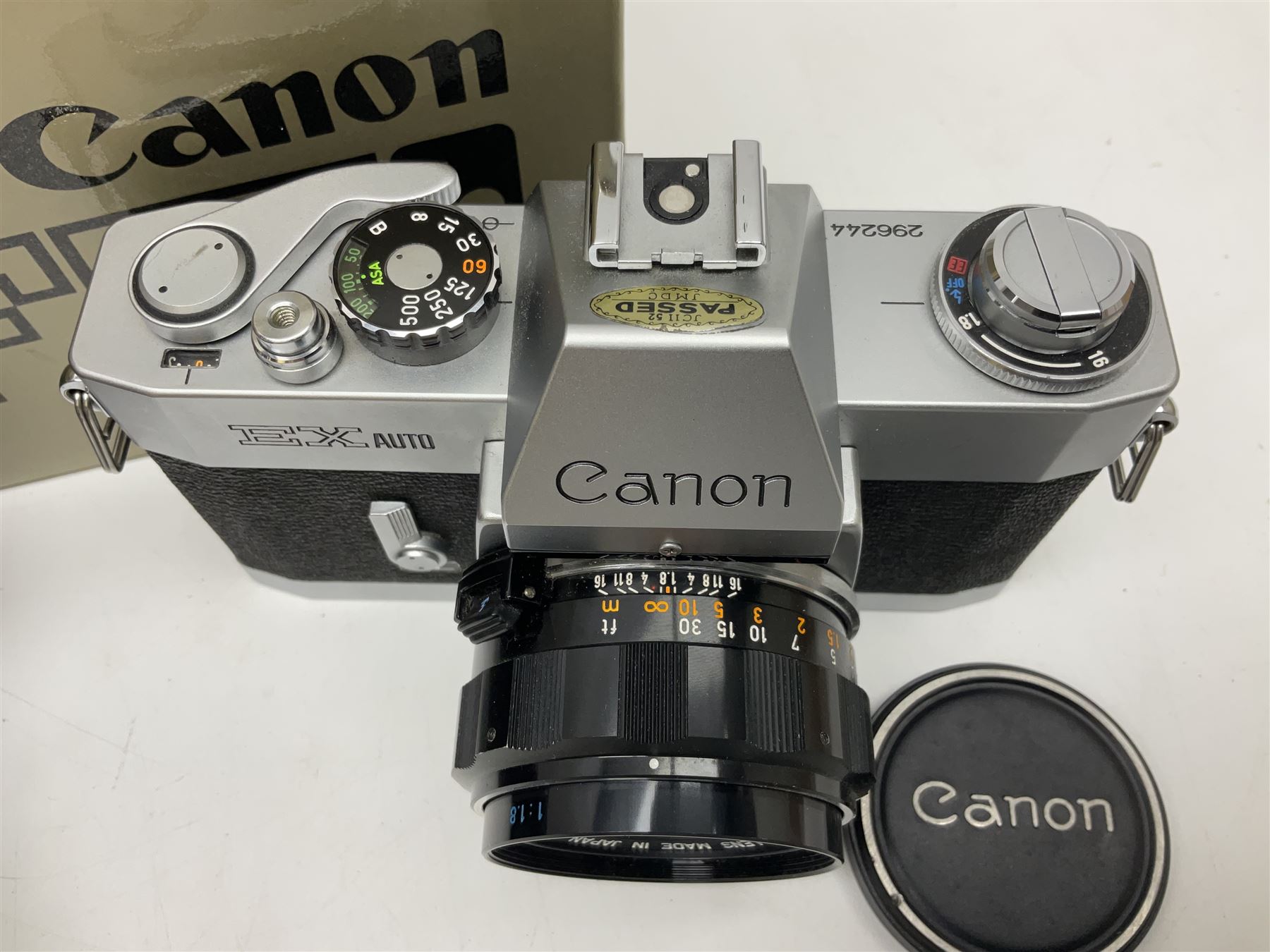 Canon FTb camera body, serial no. 715838, with 'Canon FD 50mm 1:1.8' lens, serial no. 207888, in original box, together with Canon FTb camera body, serial no. 557817, with 'Canon FD 35mm 1:3.5 S.C' lens, serial no. 126210 and Canon EX Auto camera body, serial no. 296244 with 'Canon EX 50mm 1:1.8' lens, serial no. 380869  