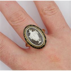 George III gold mourning ring, the bezel enclosing a lock of plaited hair under a reverse white painted urn glass panel, the black enamel border inscribed 'Sarah Stow Lundie OB 8 Apr 1780 AE 32'