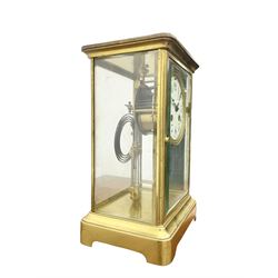 French - Edwardian 8-day four glass clock c1910, corniche style case and mercury pendulum with twin mercury glass files, enamel dial with Arabic numerals, minute dots and Fleur di Lis steel hands,  twin train movement striking the hours and half hours on a suspended coiled gong. With key.
