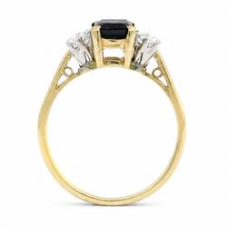 18ct gold sapphire and diamond three stone ring, single octagonal cut sapphire of approx 0.90 carat, with a round brilliant cut diamond set either side, London 1996, total diamond weight approx 0.30 carat