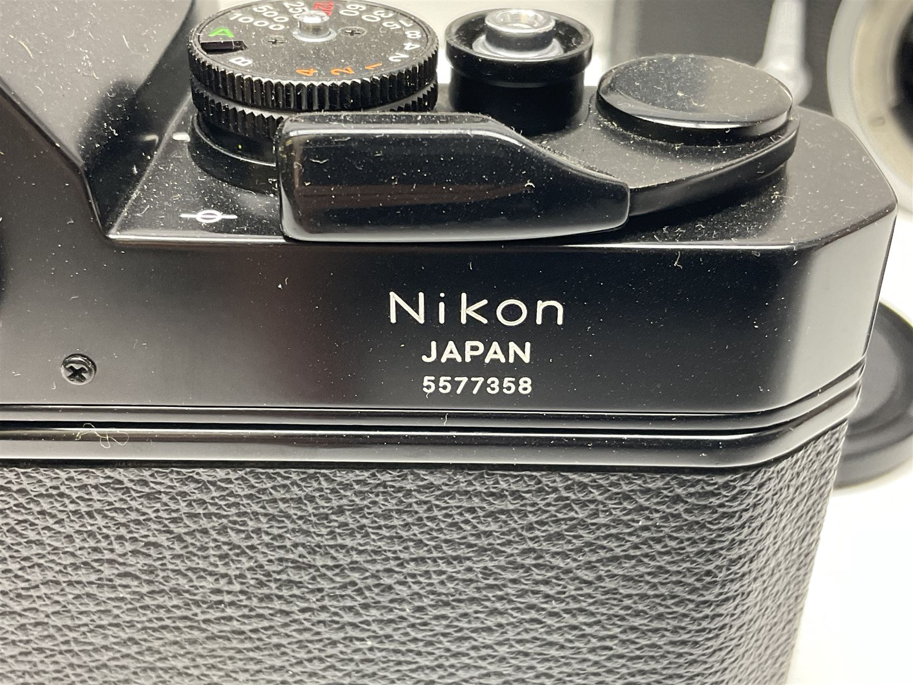 Nikkormat FT2 camera body, serial no. 5066813, in original packaging, together with Nikkormat EL camera body, serial no. 5577358, with Nikon Nikkor 50mm 1:1.8' lens no. 2143575, Nikkormat FT, serial no. 3968385, and Nikomat FT camera body, serial no. 4015491