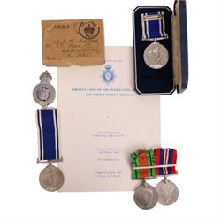 WWII medal set, comprising War medal and Defence medal, in original box together with Eliz...