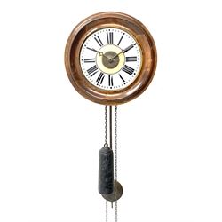 20th century Postman's style alarm wall clock, circular Roman dial in moulded stained beech surround