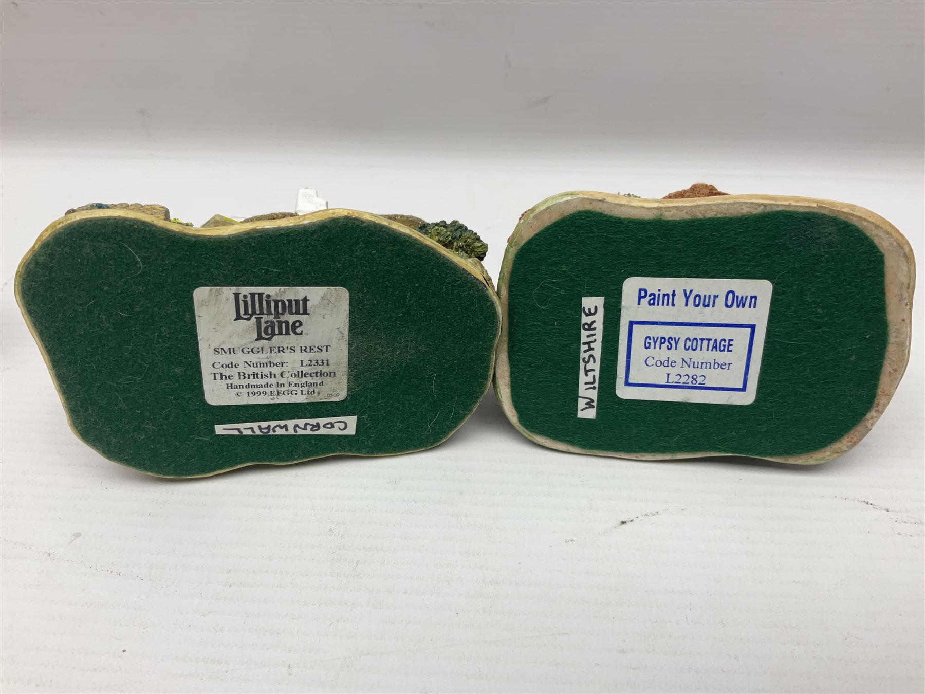 Eighteen Lilliput Lanes, including The Penny Farthing, The Pigsty, Borrowdale School, Fairy Cake Tearoom, An Apple a Day,Ladybird Cottage etc, all with original boxes 