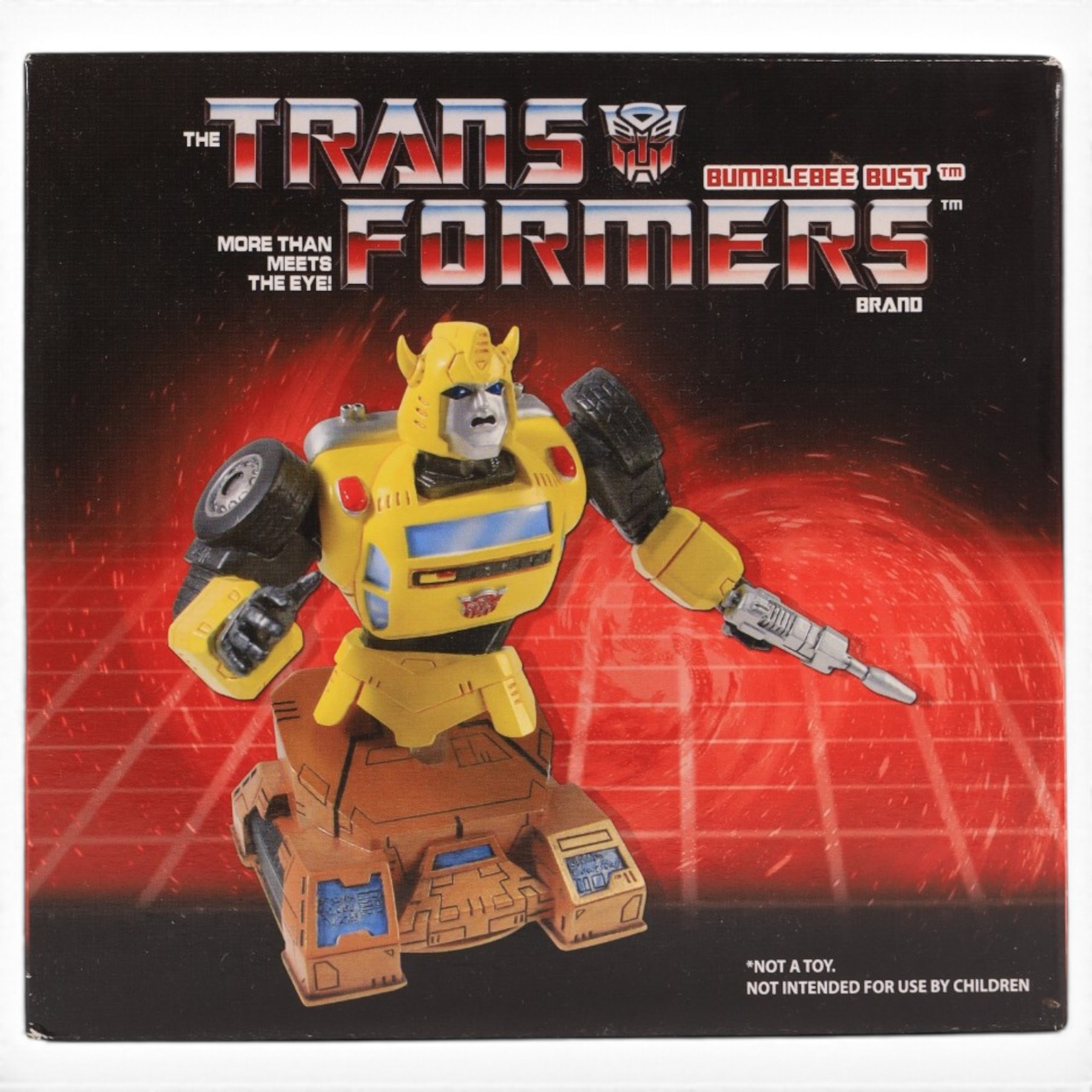 First 4 Figures Transformers Optimus Prime vs. Megatron model, together with a Hasbro Transformers Bumble Bee bust and a Hasbro Transformers Alarm Clock, all boxed