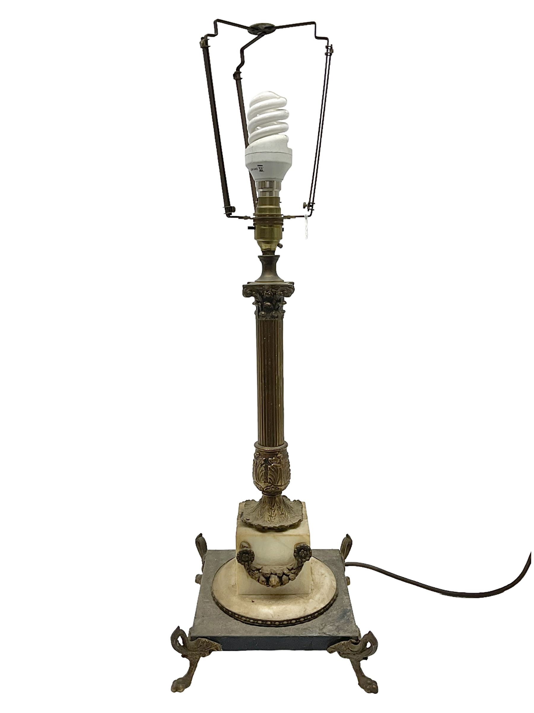 Cast brass Corinthian column design table lamp, upon hardstone base and