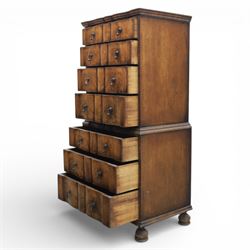 Early 20th century Queen Anne revival walnut chest on chest, the shaped cornice over an arrangement of four long drawers above three further long drawers, figured walnut veneers with feather banding and crossbanding, on turned bun supports