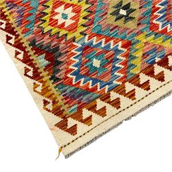 Chobi Kilim multi-coloured ground rug, overall geometric design with hooked border 