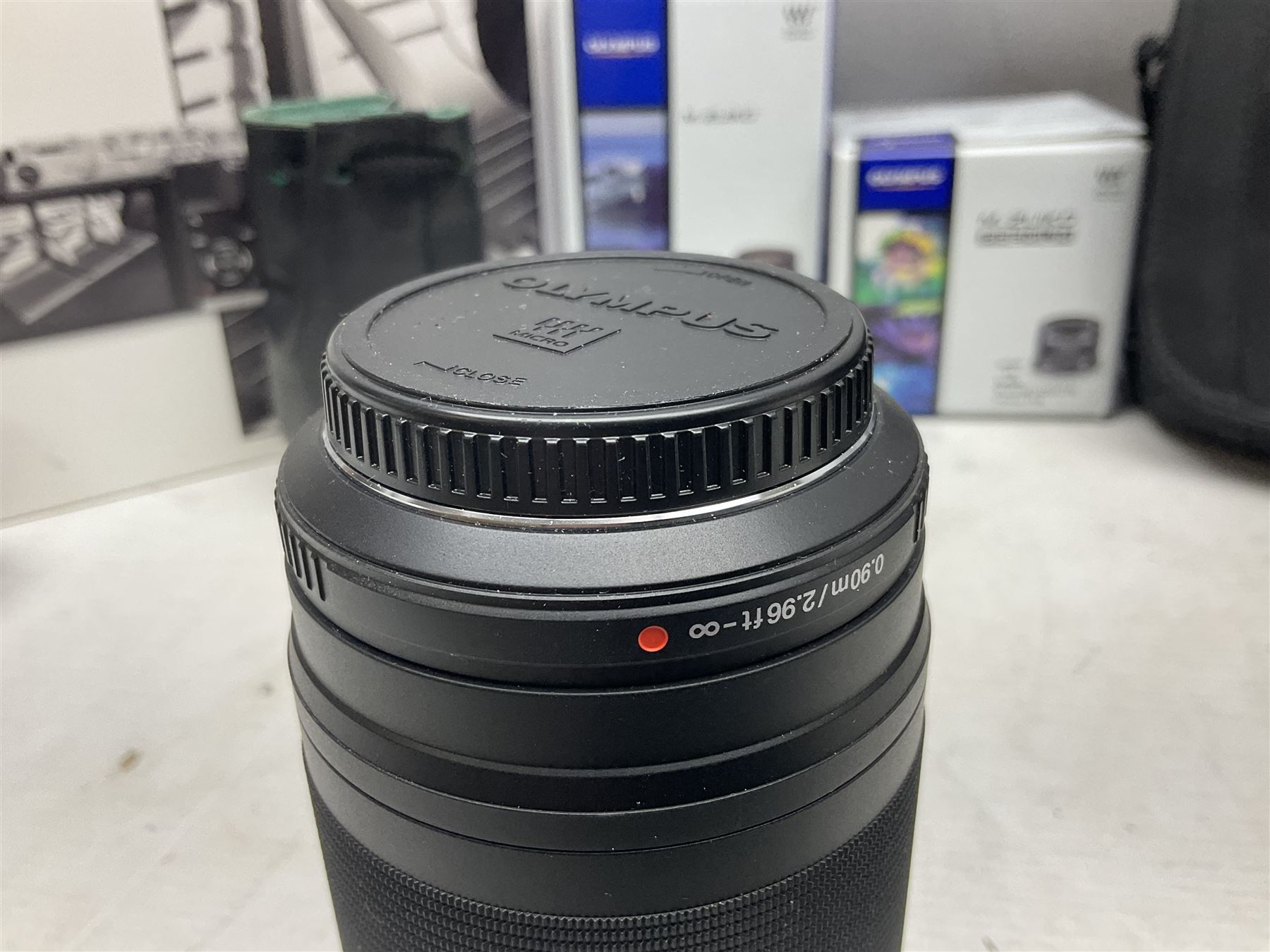 Olympus PEN-F camera body, with 'Olympus M- Zuiko Digital 25mm 1: 1.8' lens,  'Olympus M- Zuiko Digital 75-300mm 1: 4.8 - 6.7' lens and  'Olympus M- Zuiko Digital 17mm 1: 1.8' lens, with original box, together with Lowepro camera bag