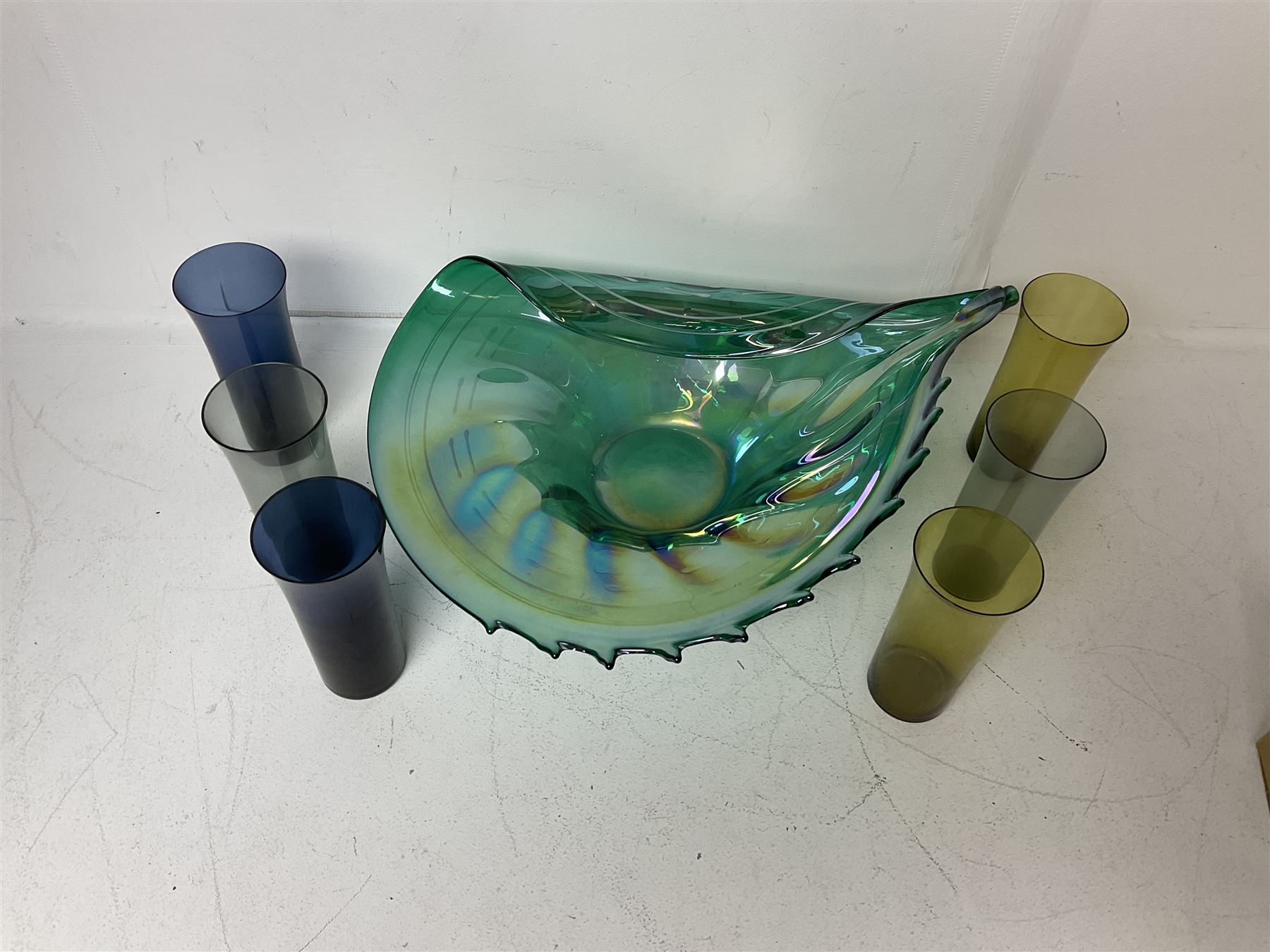 Large green studio glass conch shell bowl, with lustre finish, together with six coloured glasses, bowl W44cm