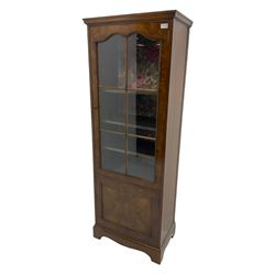 Mid-20th century walnut glazed bookcase, fitted with two cupboards