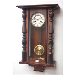  Early 20th century walnut cased Vienna wall clock, twin train driven movement striking on coil, H69cm  