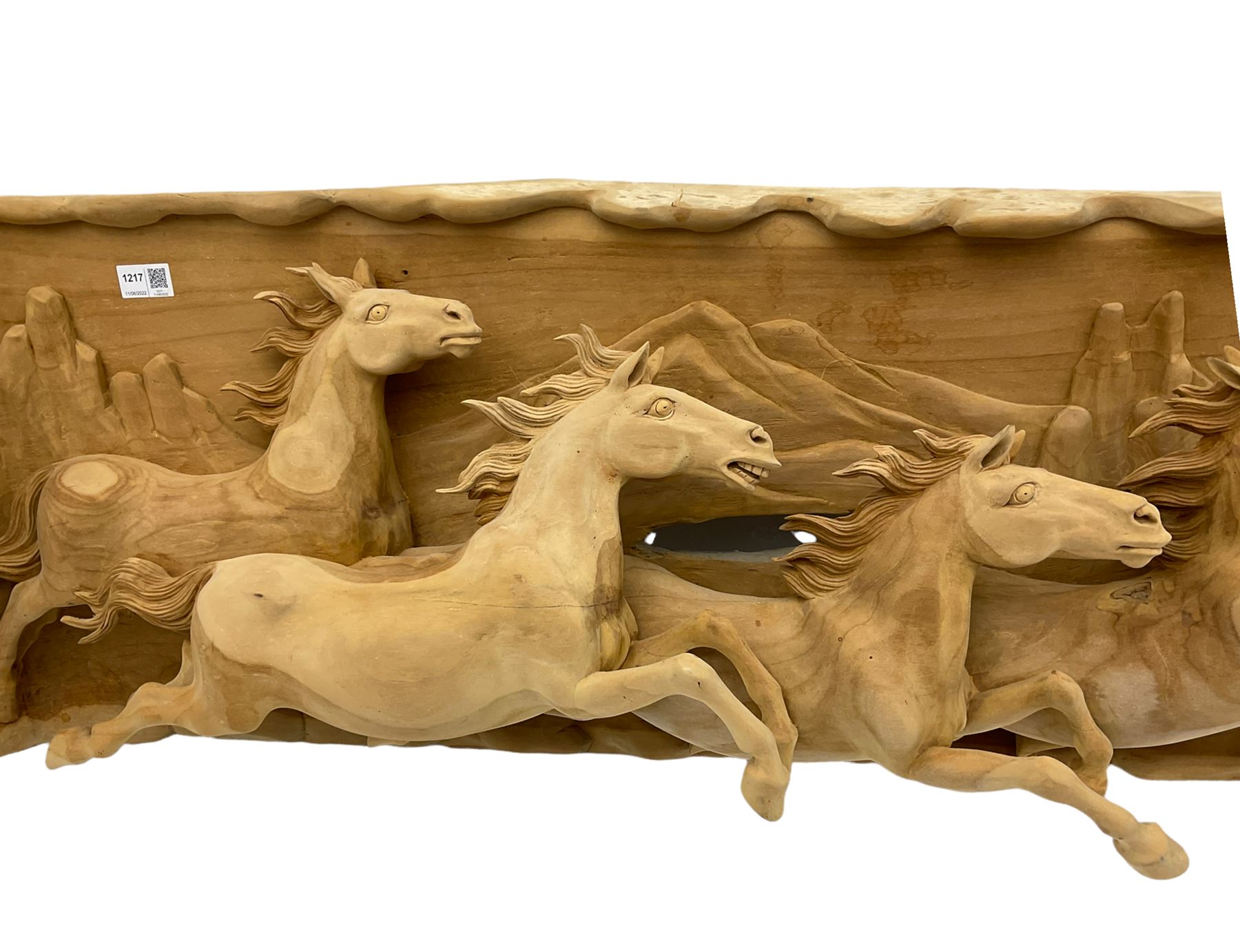 High relief carved cherry wood wall art - eight galloping horses with mountainous background