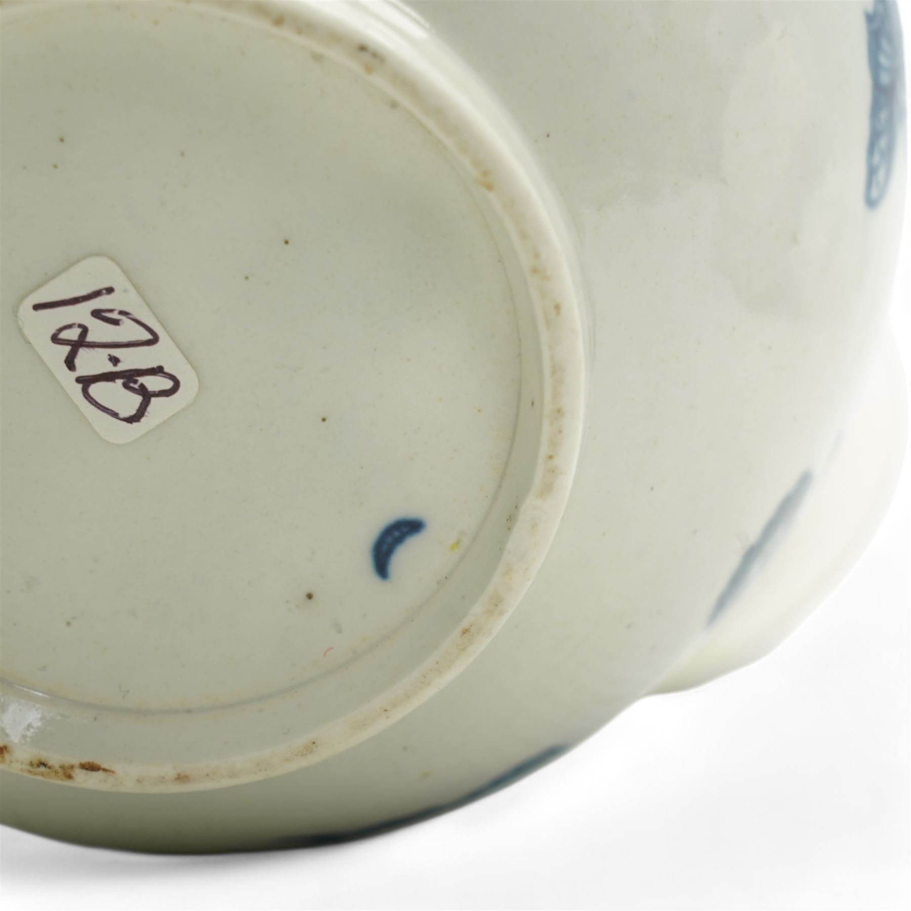 First Period Worcester porcelain teapot decorated in the Three Flowers pattern, with flower knop handle, H15cm and Worcester fluted dish decorated in the same pattern, both with cresent marks beneath (2)