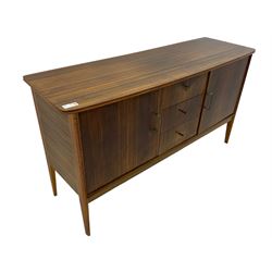 Peter Hayward for Vanson - mid-20th century teak sideboard, rectangular top with rounded corners over three central drawers, flanked by two cupboard doors enclosing shelves, raised on tapered supports