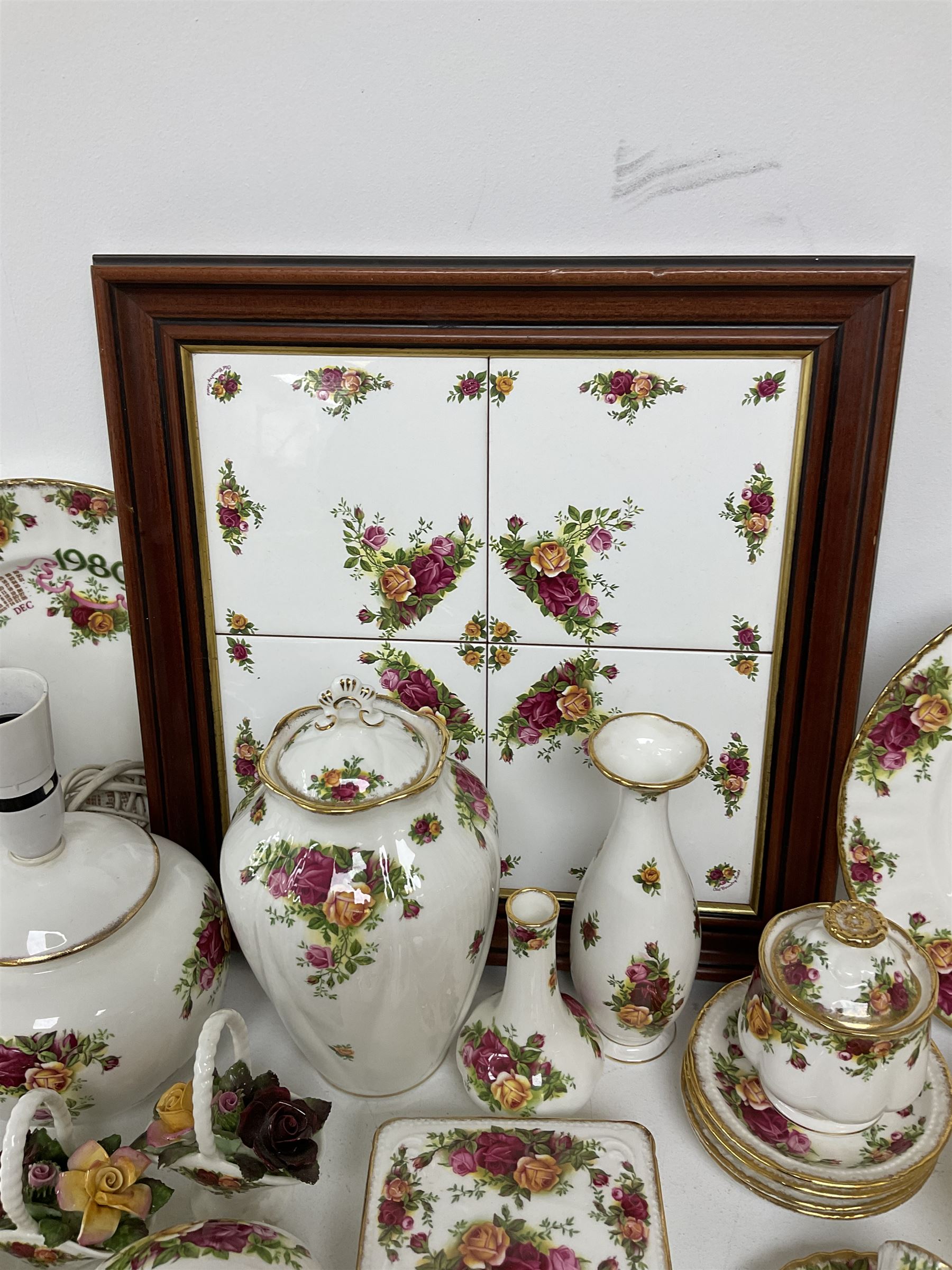 Royal Albert Old Country Roses pattern ceramics, to include table lamp, lidded vase, two pairs of salt and pepper shakers, cups and saucers, plates, biscuit jar, bowls, lidded preserve pot, vases, dishes, knives, napkin rings, lidded jars and box, pair of candlesticks etc