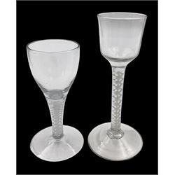18th century drinking glass, the ogee bowl upon double series opaque twist stem and conical foot, H15.5cm and another with ovoid shaped bowl, upon double series opaque twist stem and conical foot 