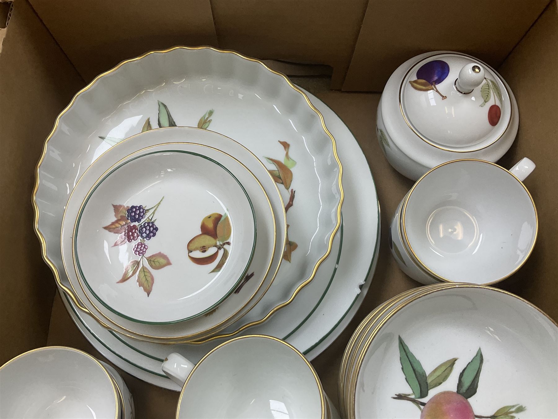 Royal Worcester Evesham and Evesham Vale tea and dinner wares, to include, three large covered tureens, coffee pot, eight tea cups and saucers, milk jug, two covered sucriers, boxed serving spoons etc, approx .130