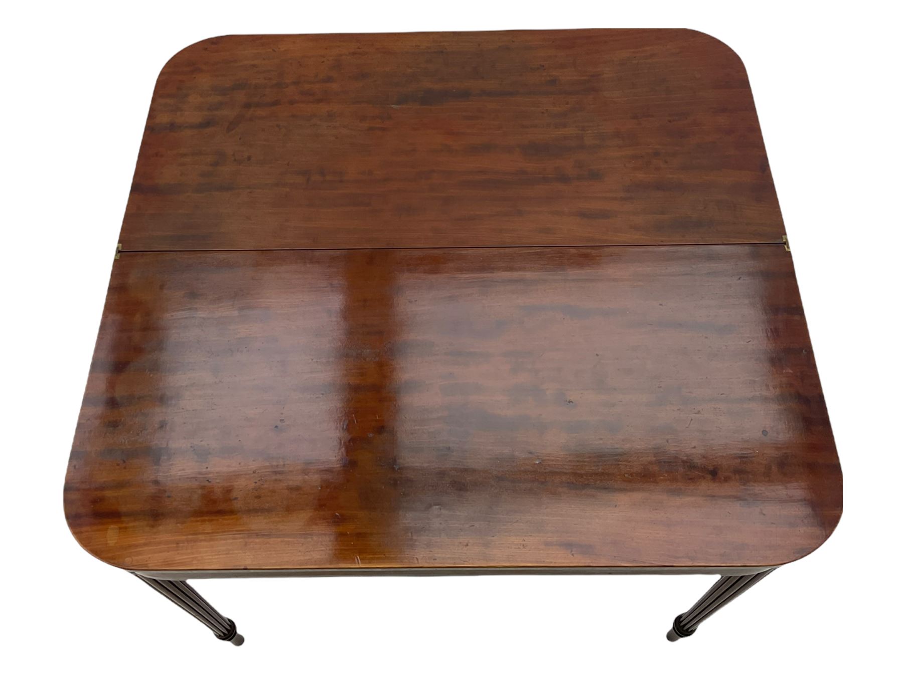 Early 19th century tea table, rectangular fold-over top with rounded corners, the frieze and sides inlaid with satinwood panels, double gate-leg action base, on reeded supports 