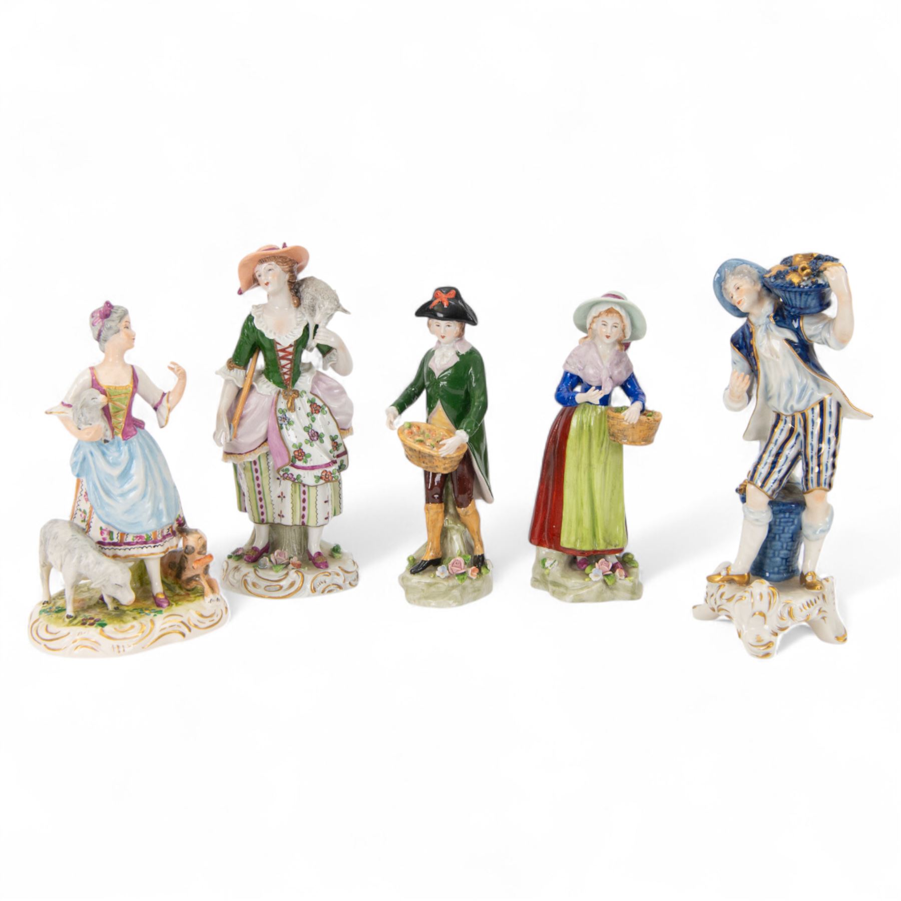 Five continental figures, including three Sitzendorf examples and a Rudolf Kammer example, tallest 20cm