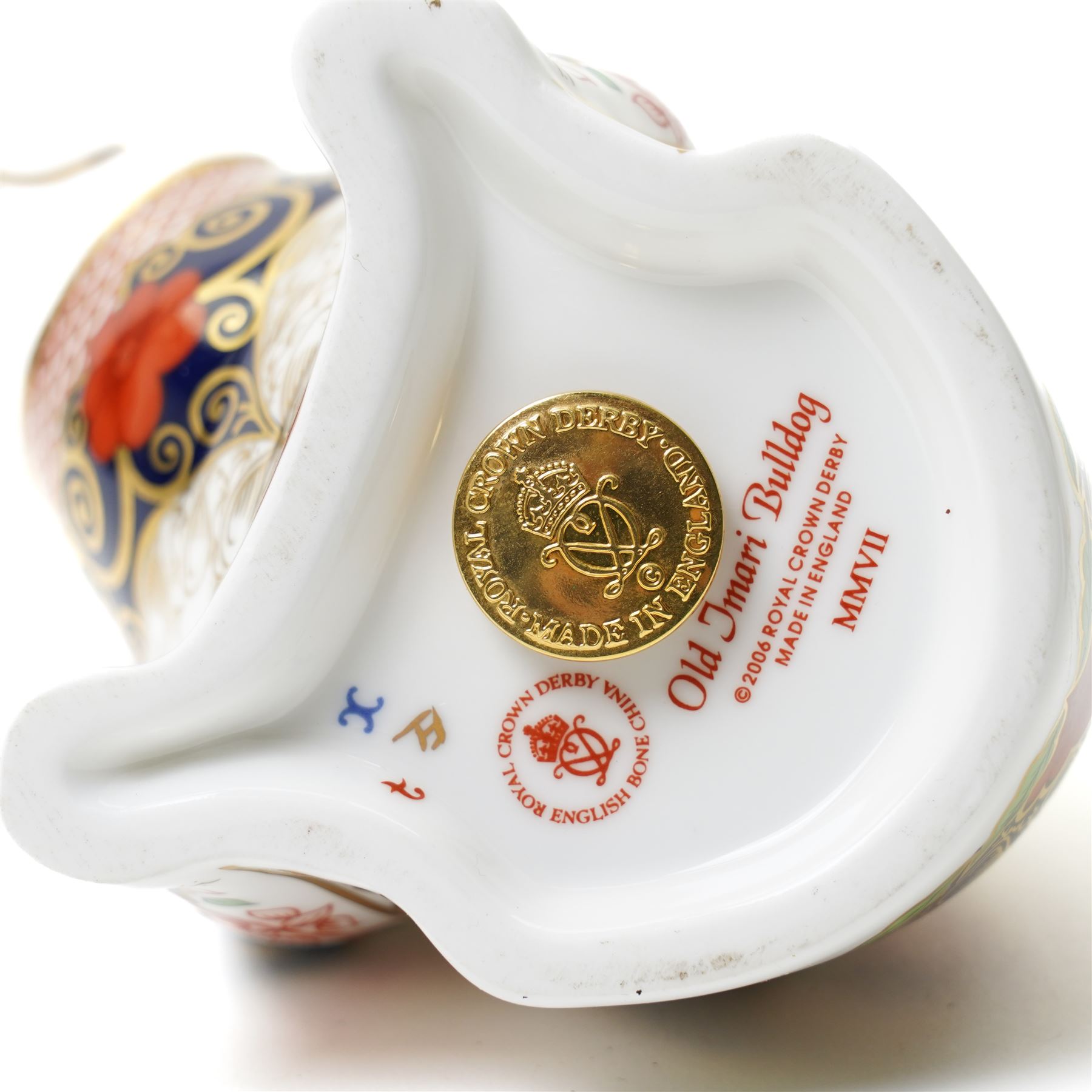 Royal Crown Derby Beaver and Bulldog paperweights, each with gold stopper, boxed (2)