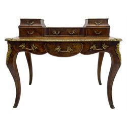 Late 19th to early 20th century French figured walnut writing desk, raised back fitted with drawers, shaped top with Kingwood banding and foliage cast edge moulding, fitted with single drawer, on cabriole supports mounted by shell and flower head cartouches 