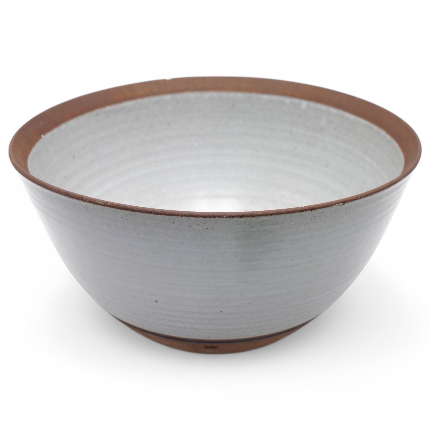 David Lloyd Jones (1928-1994); large studio pottery stoneware bowl, in speckled grey glaze with irregular iron rim, impressed mark to base, D32cm 
