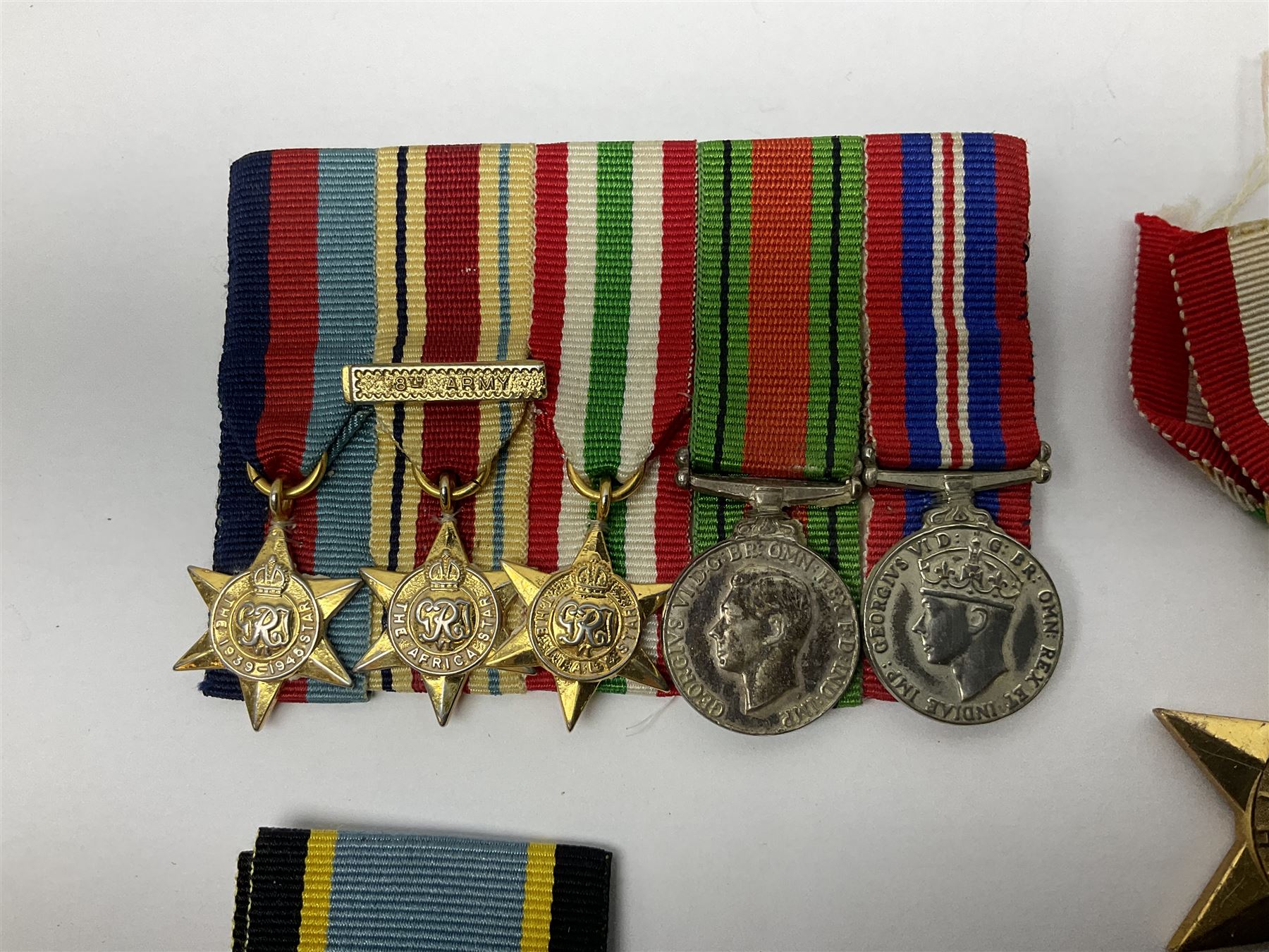 Gaunt & Son Territorial Force Nursing Service cape medal; cased; WW1 British War Medal and 1914-15 Star (names erased); two MID oak leaves; Polish and American medals; eight replica medals including VC, MM, Air Crew Europe Star etc and replica group of five WW2 miniatures etc