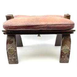 Camel stool with brass mounted detail to legs, and red leather seat, H33.5cm 