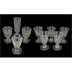 Eight 19th century tripart moulded rummers and a further similar drinking glass, comprising set of five, pair, and two further examples, each with moulded fluting or spherical decoration to the bowls, largest H20.5cm