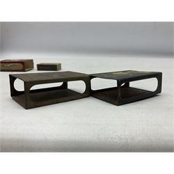 Victorian leather cigar protector with metal match striking plate on the end and internal spring to hold the cigars in place; expands for differing lengths of cigar, minimum L12.5cm; another similar leather cigar case marked Middlemore's Patent with attached vesta case and striker; three Bryant & Mays tin-late matchbox holders including 1935 Jubilee; and small box of matches (6)