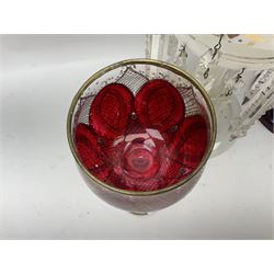 Bohemian red glass lustre, painted with stylised floral and foliate decoration, together with a milk glass example and two bohemian goblets converted to lustres 