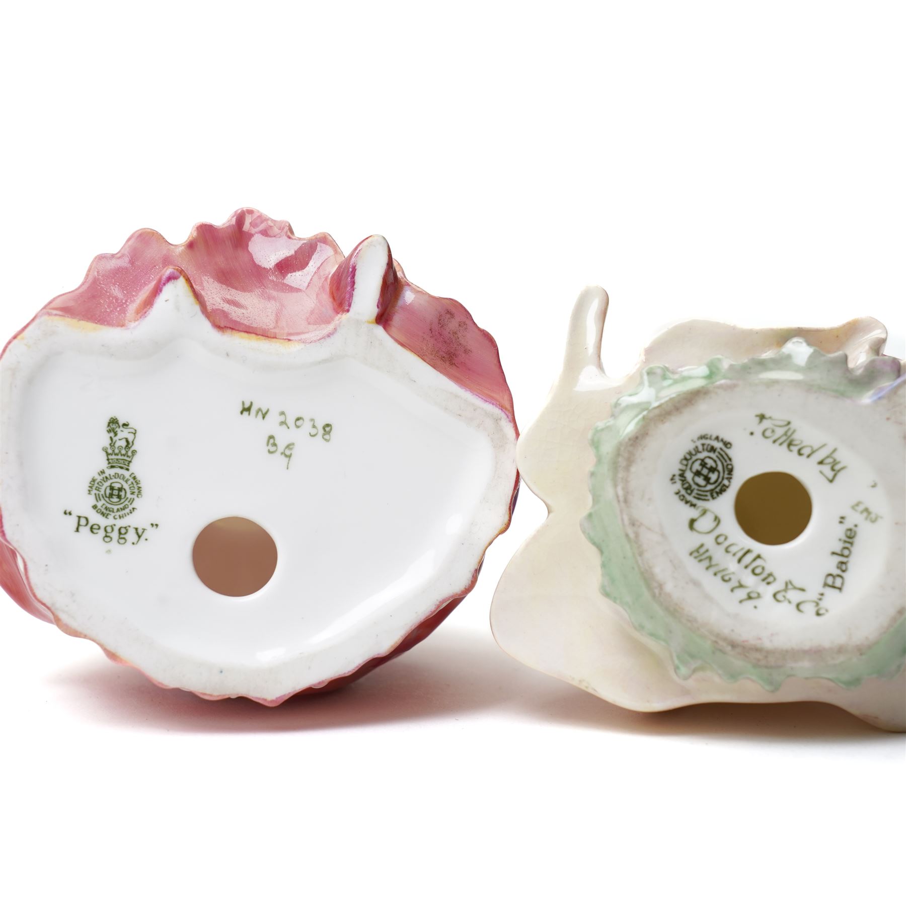 Seven Royal Doulton figures, comprising Chloe HN1470, A Victorian Lady HN727, Tinkle Bell HN1677, Babie HN1679, Lily HN1798, Peggy HN2038, The Rag Doll HN2142 (7)