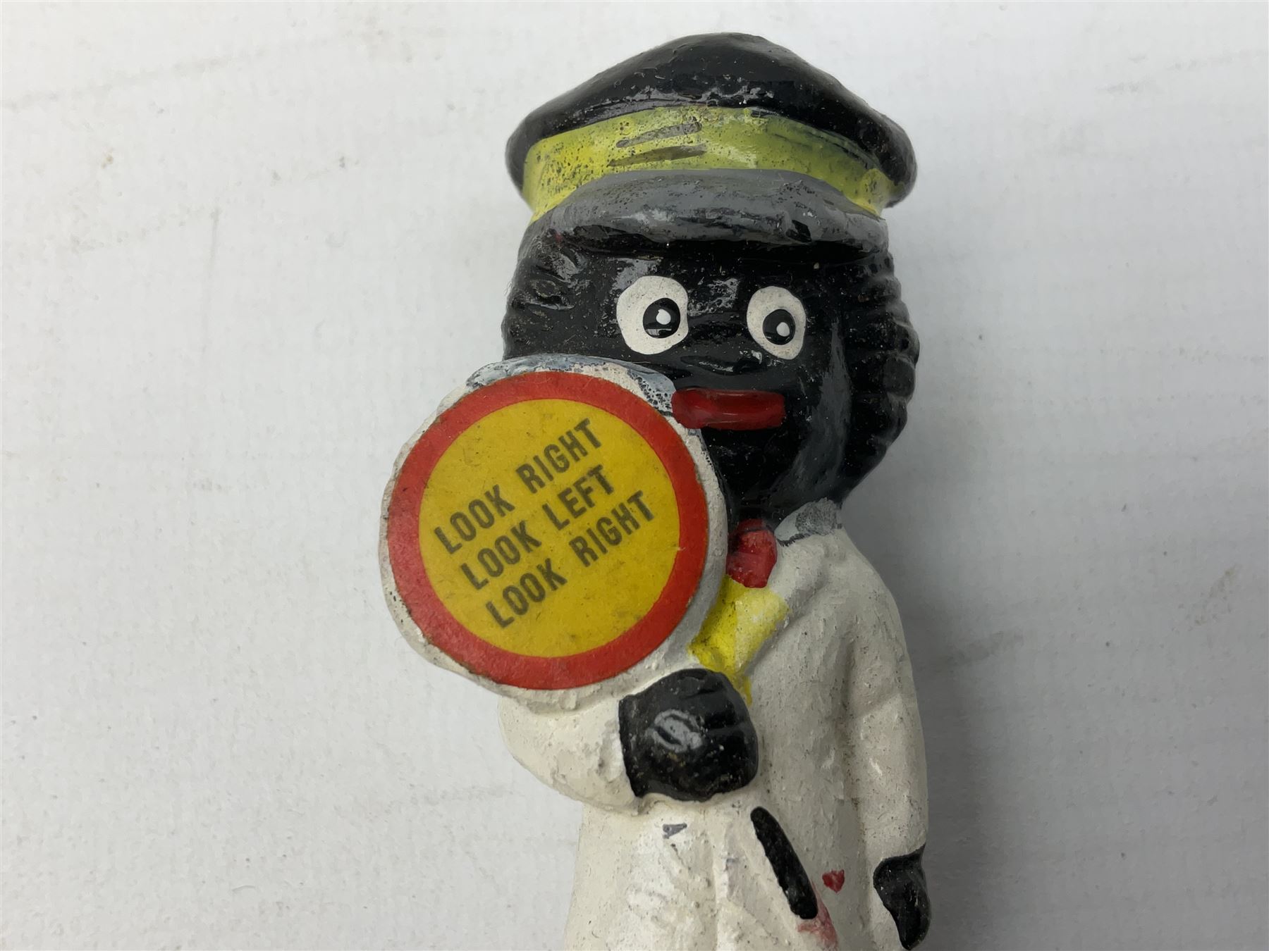 Robinson Jam plaster Golly band, including drummer and singer, H7.5cm

Originally handmade by mothers in Africa for their children from old fabric and cloth, the golly doll was adopted as the mascot and trademark for the Robertson's confectionery brand around 1910 after the company's founder John Robertson visited the US and noticed children playing with them. Robertson's Gollies have been collected by people across the UK and around the world for generations but garnered a contentious image in the 1980s because of links to racism. The trademark was removed from Robertson's branding in 2001.