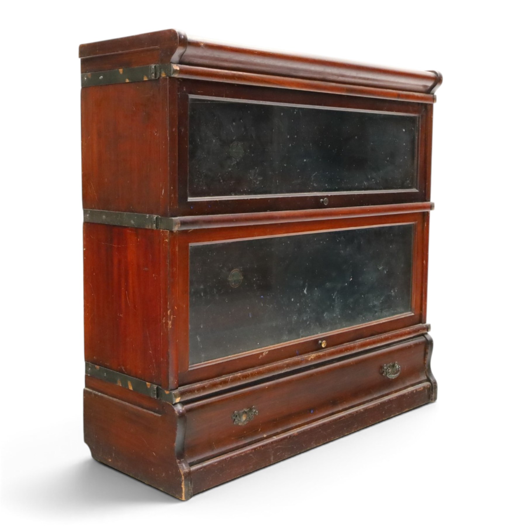 Globe Wernicke - early 20th century mahogany two-tier stacking library bookcase, fitted with glazed up-and-over doors, two drawers to the plinth base; together with a similar single-tier example (W87cm D27cm H54cm)
