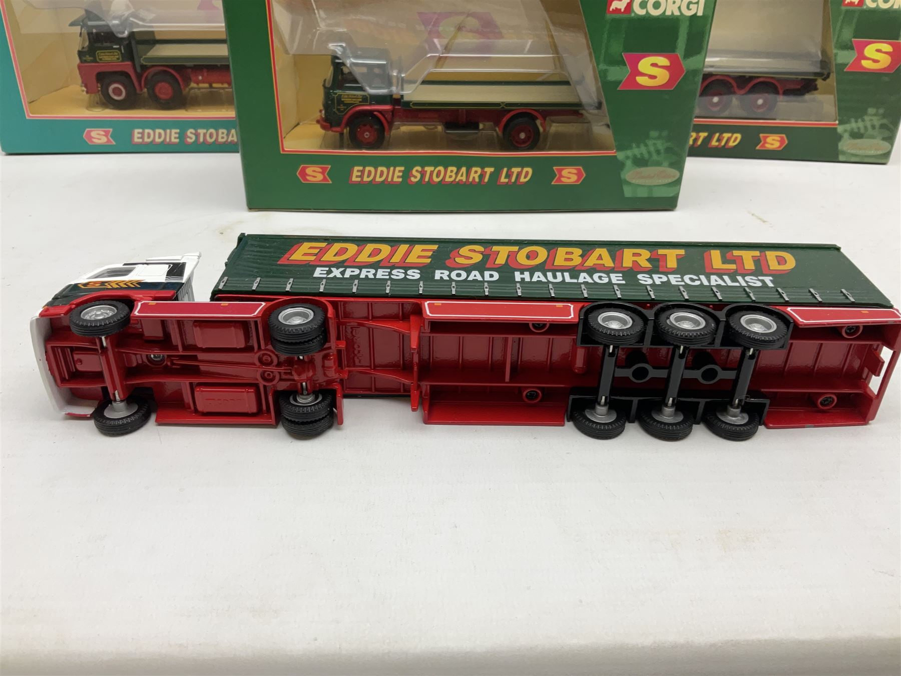 Corgi Eddie Stobart - four lorries in the Superhaulers Series Nos. TY86650, TY86649, TY86647 & TY86646; three other lorries Nos. 23203, 29103 & 20903; all boxed; and two unboxed lorries (9)