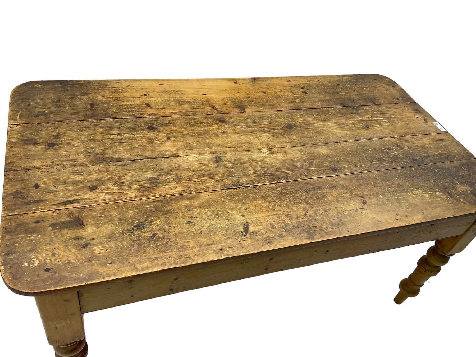 Victorian pine farmhouse dining table, rectangular plank top with rounded corners, on turned supports 