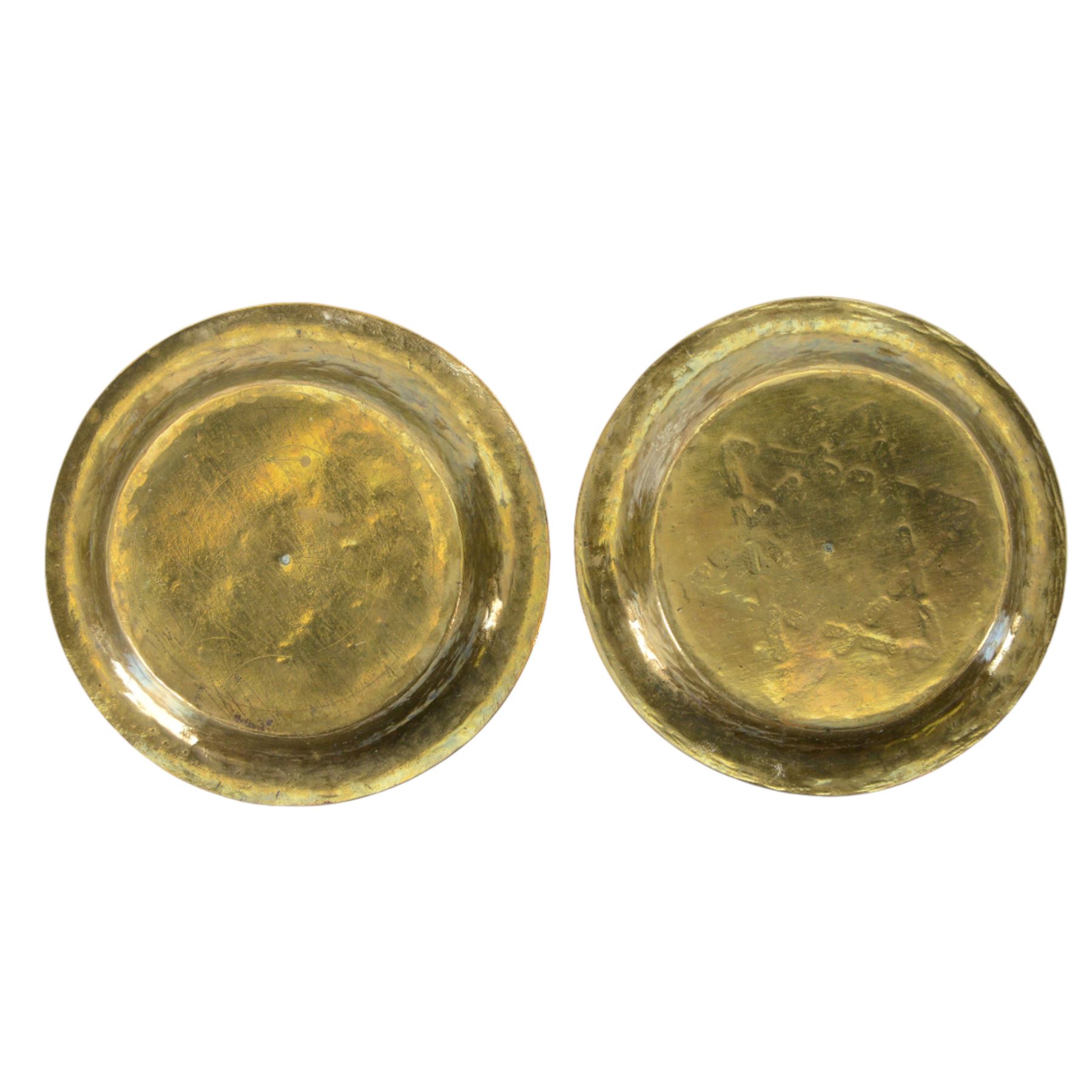 Indian miniature brass lota, decorated with peacocks, together with another similar examples and two brass dishes, largest lota H8cm 