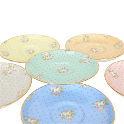 Spode six coffee cups and saucers cased set, decorated with floral sprigs on a polka dot ground with gilt detail