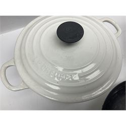 Le Creuset cast iron casserole dish, together with two Waterford cast iron dishes and a frying pan